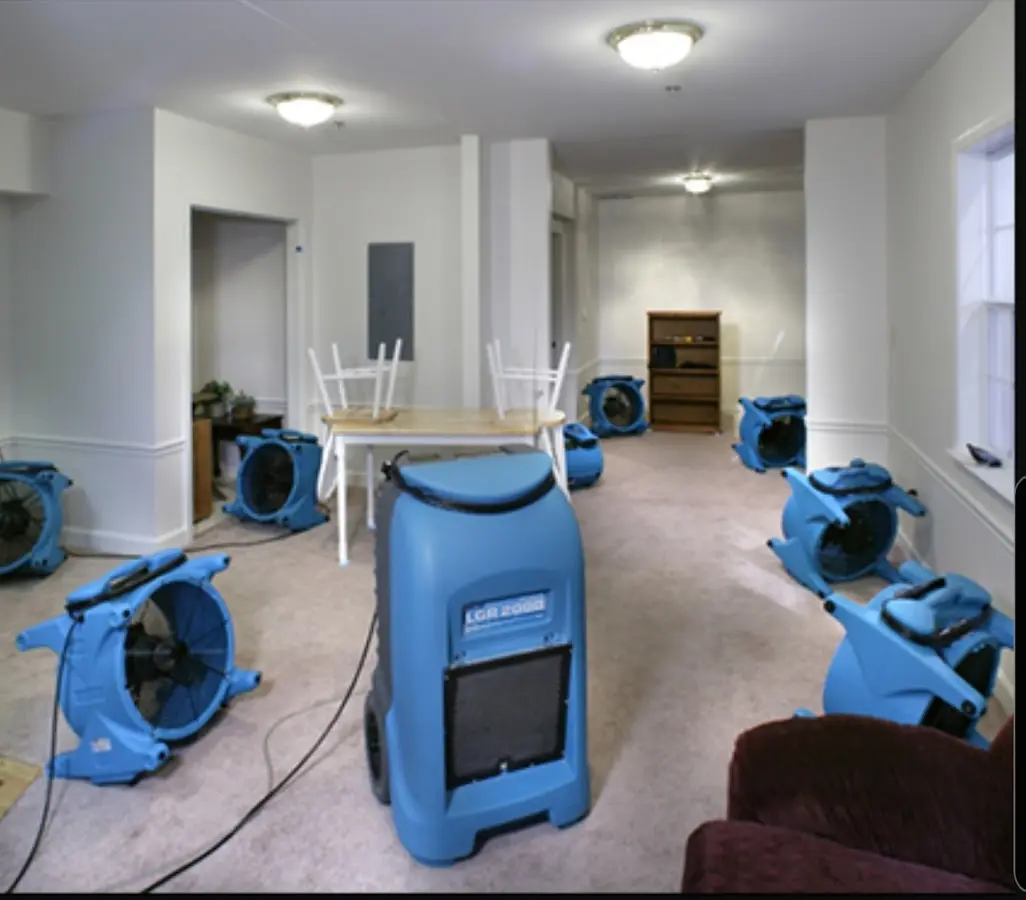 Air movers and dehumidifier setup for Water Damage Restoration in Anniston